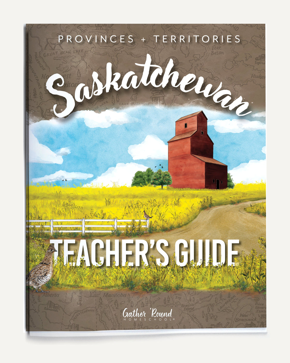 Teacher's Guide book for Saskatchewan Provinces + Territories, featuring a colorful illustration of a red grain elevator in a yellow field under a blue sky, with the title 'Saskatchewan Teacher's Guide' on a brown map-style background.