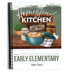 A spiral-bound notebook cover featuring a watercolor-style illustration of a rustic kitchen scene with the words 'Homestead Kitchen' and 'EARLY ELEMENTARY.' The cover includes a black spiral binding and a white lower section with a name line and small Gather Round Homestead branding.