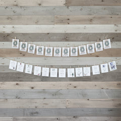 Advent calendar with natural elements  strung on a line like a banner